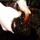 Image for article titled Dyeing Clothes With Used Motor Oil Is The Best And Worst Solution To Your Stain Problem